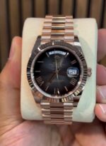 Rolex Day-Date President full gold luxury watch Roman numeral dial with elegant classic design Day and date display for added functionality Fluted bezel with premium polished finish Iconic President bracelet for comfort and prestige