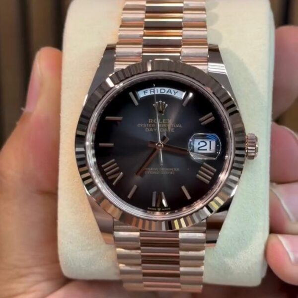 Rolex Day-Date President full gold luxury watch Roman numeral dial with elegant classic design Day and date display for added functionality Fluted bezel with premium polished finish Iconic President bracelet for comfort and prestige