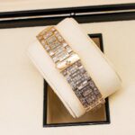 Patek Philippe Rose Gold Diamond-Studded Watch with Baguette Diamonds - Image 2