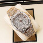 Patek Philippe Rose Gold Diamond-Studded Watch with Baguette Diamonds - Image 3